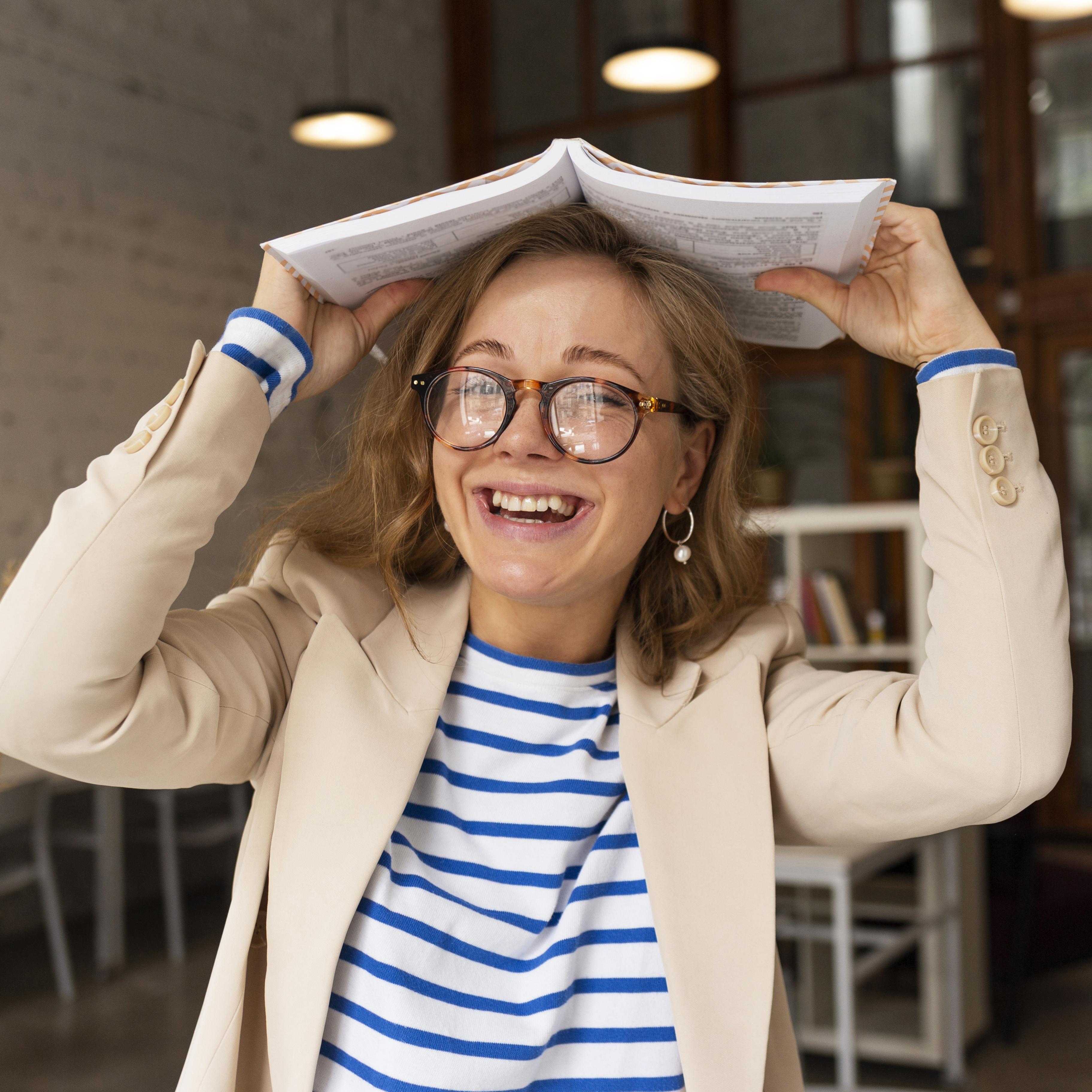 portrait-smiley-teacher-with-book-head