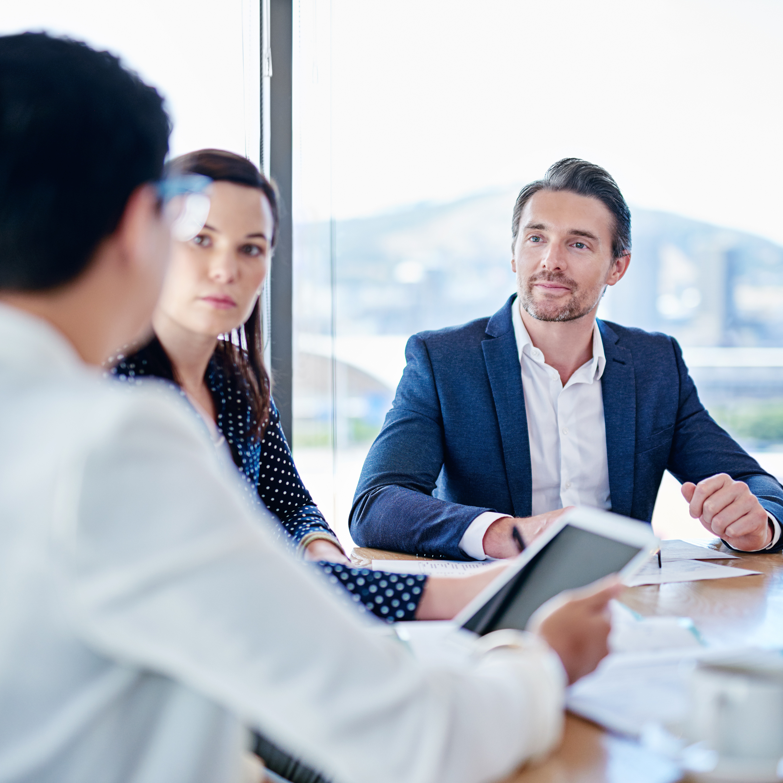 sharing-strategies-boardroom-cropped-shot-corporate-businesspeople-meeting-boardroom